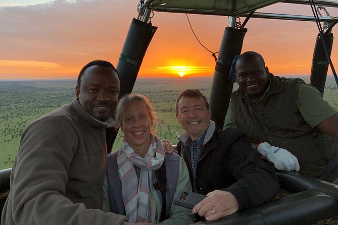Balloon Safari & Bush Breakfast in Serengeti - Miracle Experience - Landing and the traditional bubbly toast