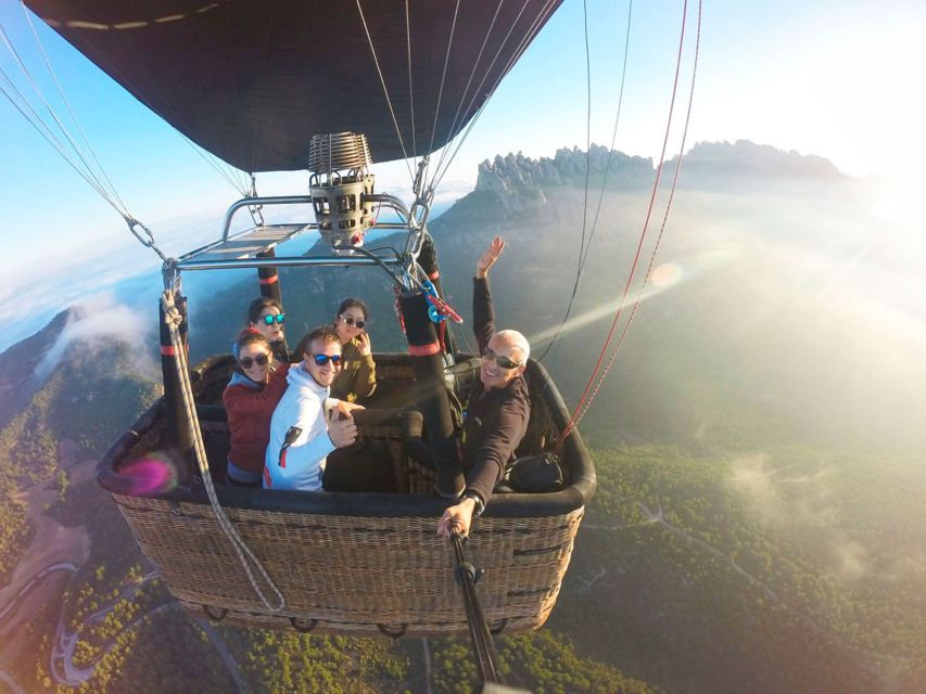 Barcelona: Montserrat Hot-Air Balloon & Monastery Experience - Helping inflate the balloon before takeoff