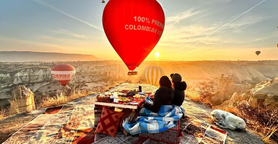 Breakfast with balloons in the valley ( private table ) - A private table beneath Cappadocia’s morning sky