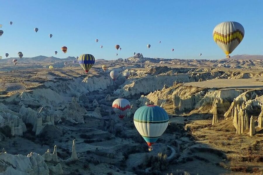 Cappadocia: Göreme Sunrise Hot Air Balloon Ride w/ Breakfast - Watching the balloons prepare for takeoff