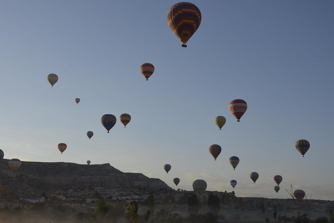 Cappadocia Hot Air Balloon Ride with Breakfast and Champagne - Launching above the fairy chimneys