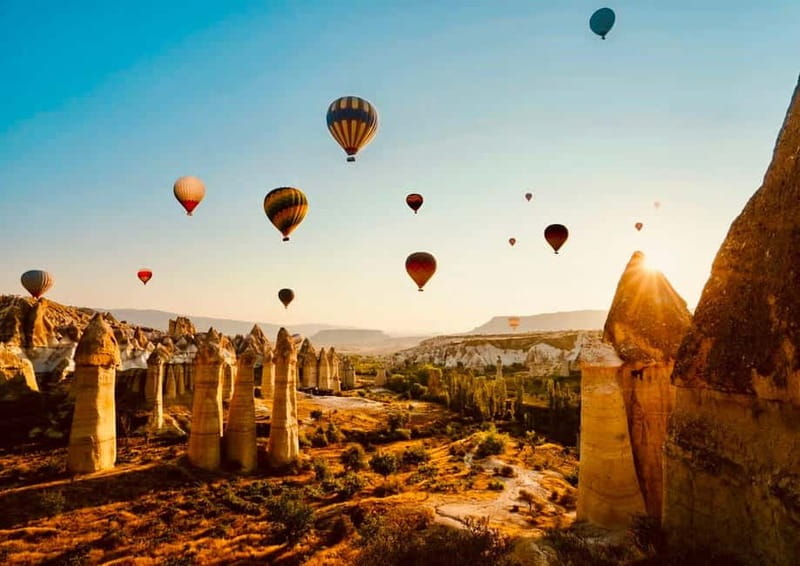 Cappadocia: Sunrise Hot Air Balloon in Göreme and Transfer - Snacks, safety, and boarding the basket