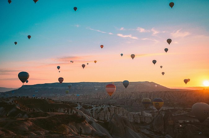 Cappadocia Sunrise Hot Air Balloon Ride with Hotel Transfer - Snacks, toast, and the flight certificate