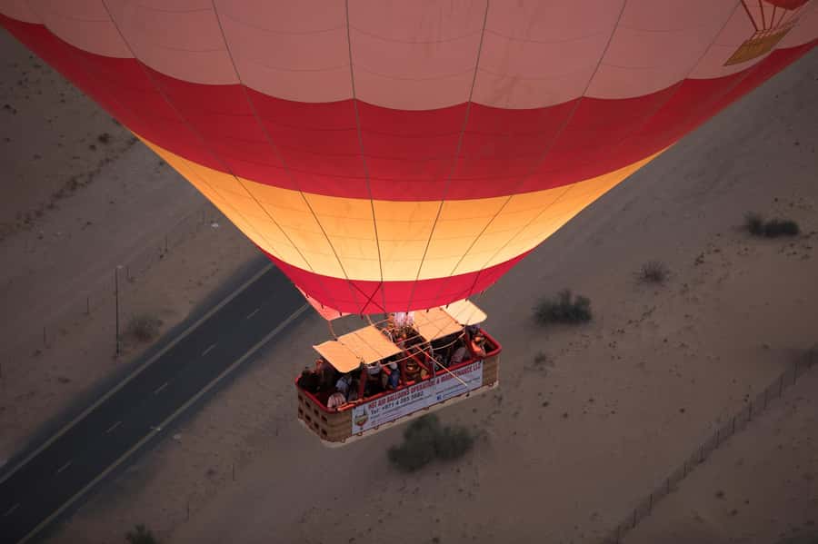 Dubai: Hot Air Balloon Ride & Falcon Show Over the Desert - Landing, return transfer, and the four-hour schedule