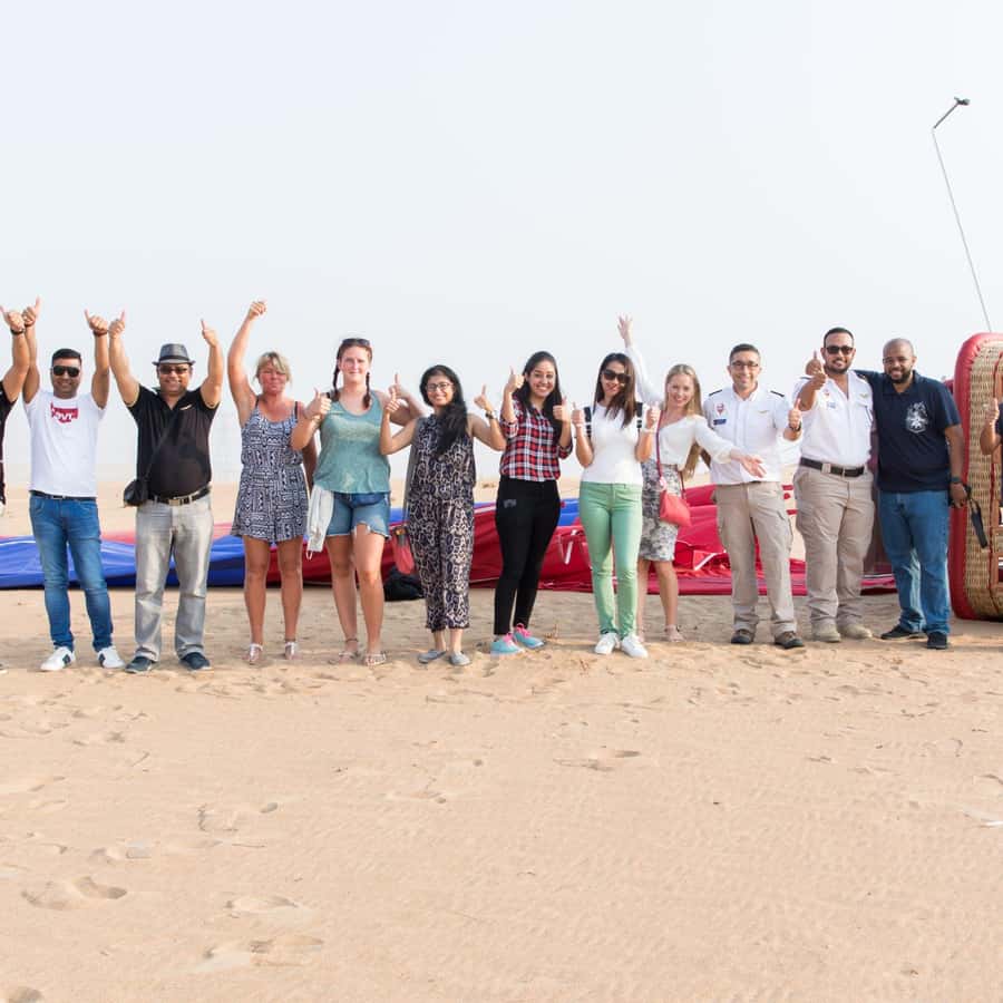 Dubai: Sunrise Hot Air Balloon Tour with E-Certificate - Falcon Photo, Certificates, and Included Extras