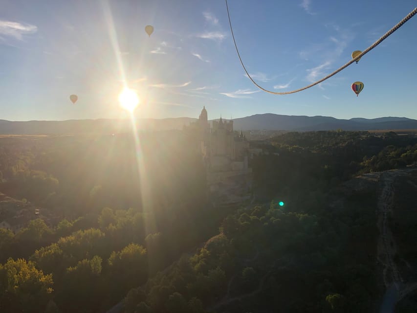 From Madrid: Hot Air Balloon over Segovia with Transfer - Landing, picnic, and the Cava toast