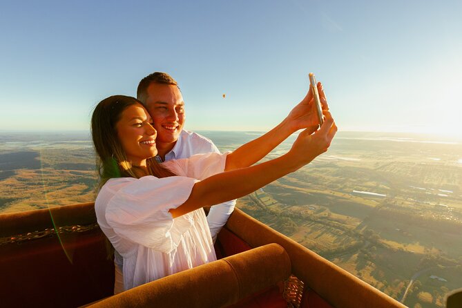 Gold Coast Hot Air Balloon + Winery Breakfast + Return Transfers - Landing, balloon pack-up, and the muddy reality