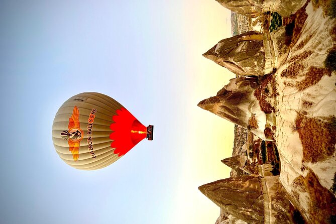 Goreme/Cappadocia Sunrise Hot Air Balloon Flight with Pickup - Watching the balloon rise from the launch field