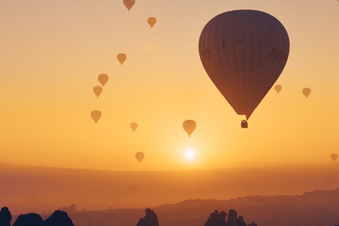 Hot Air Balloon Flight in Cappadocia with Experienced Pilots - Landing, snacks, and the small celebration