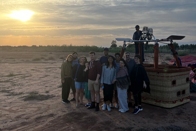 Hot air balloon flight in the desert with camel ride - Sunrise above the Jbilat desert