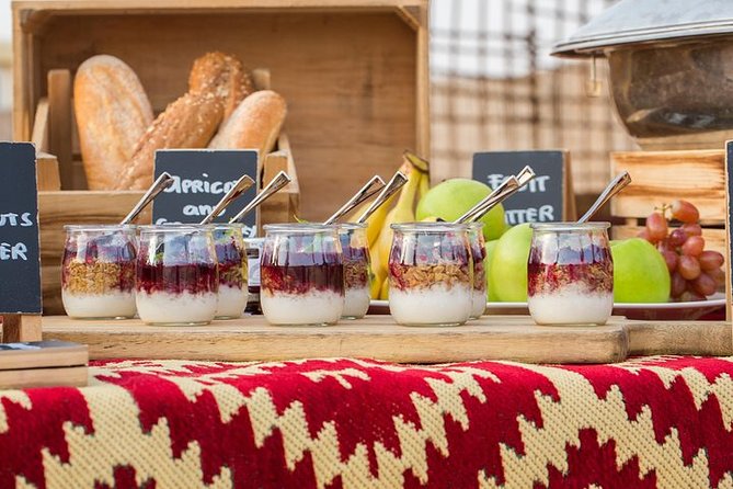 Hot Air Balloon Ride With Gourmet Breakfast & Falcon Show - A gourmet breakfast at a traditional Bedouin camp