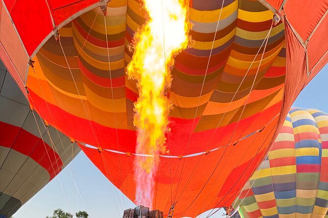 Johannesburg: Hot Air Balloon Flight along Magalies Valley - Watching the balloon come alive at the Clubhouse Pavilion