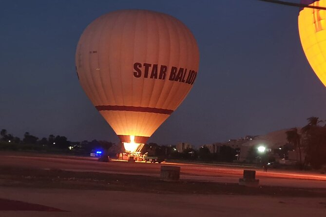 Luxury Hot Air Balloon Ride in Luxor with Transfers Included - What the guide adds to the flight