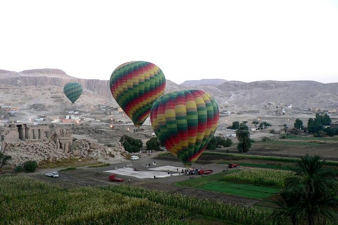 One Package Sunrise Hot Air Balloon Ride in Luxor and West Bank Private Tour - Valley of the Kings: tombs below the mountain