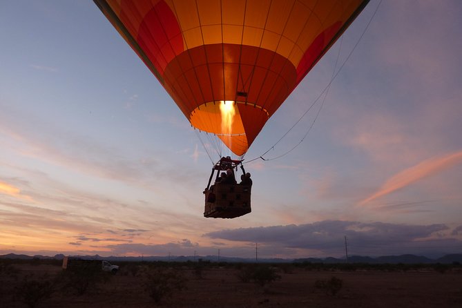 Phoenix Afternoon Hot Air Balloon Ride with Bubbly + Charcuterie - Landing, Champagne, and the Balloonists Ceremony