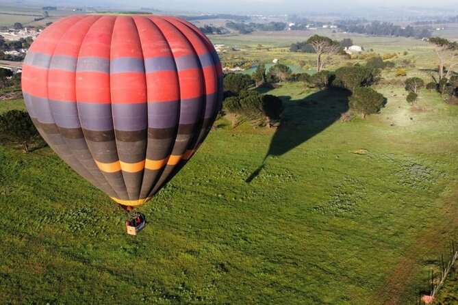 Private Hot Air Balloon Tour in Cape Town - Watching the balloon rise at Joostenberg Vlakte