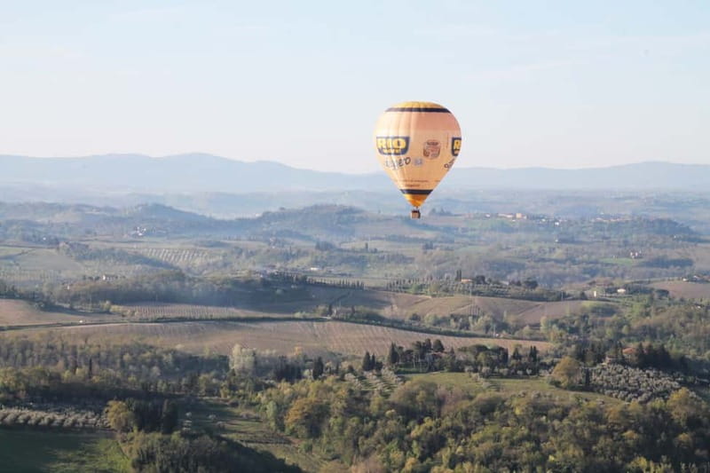 Siena: Balloon Flight Over Tuscany with a Glass of Wine - One hour above the Tuscan countryside