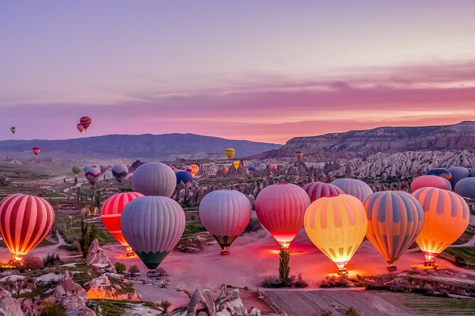 Sunrise Balloon Tour in Cappadocia with Breakfast & Champagne - Sunrise, photographs, and the view below