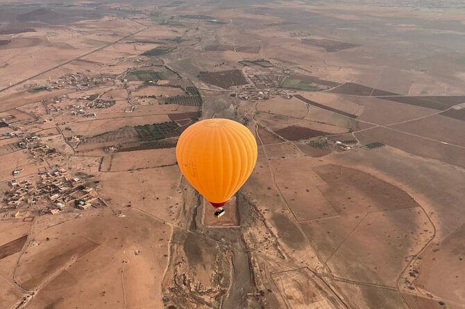 Viator Exclusive: Private Sunrise Balloon Ride with Royal Breakfast on Board - Riding Camels Through the Palmeraie